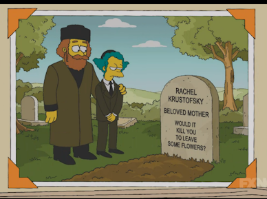 Rabbi Krustofki visiting the grave of his late wife Rachel